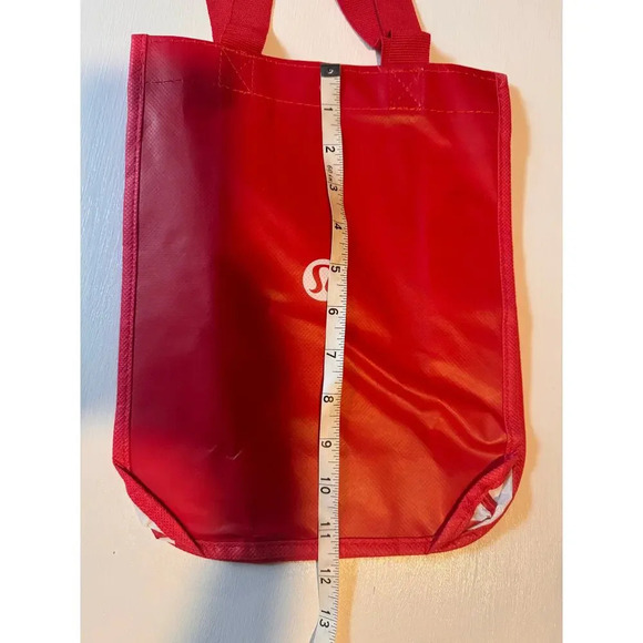 NWOT Lululemon Red Reusable Tote Bag with button clap to close - Picture 2 of 6
